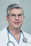 John W. Shuck, M.D.